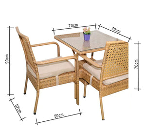 An outdoor set of 4 beige chairs and a table