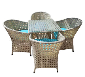 An outdoor set of 4 chairs and a table