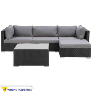 An outdoor set with a L-shape sofa set