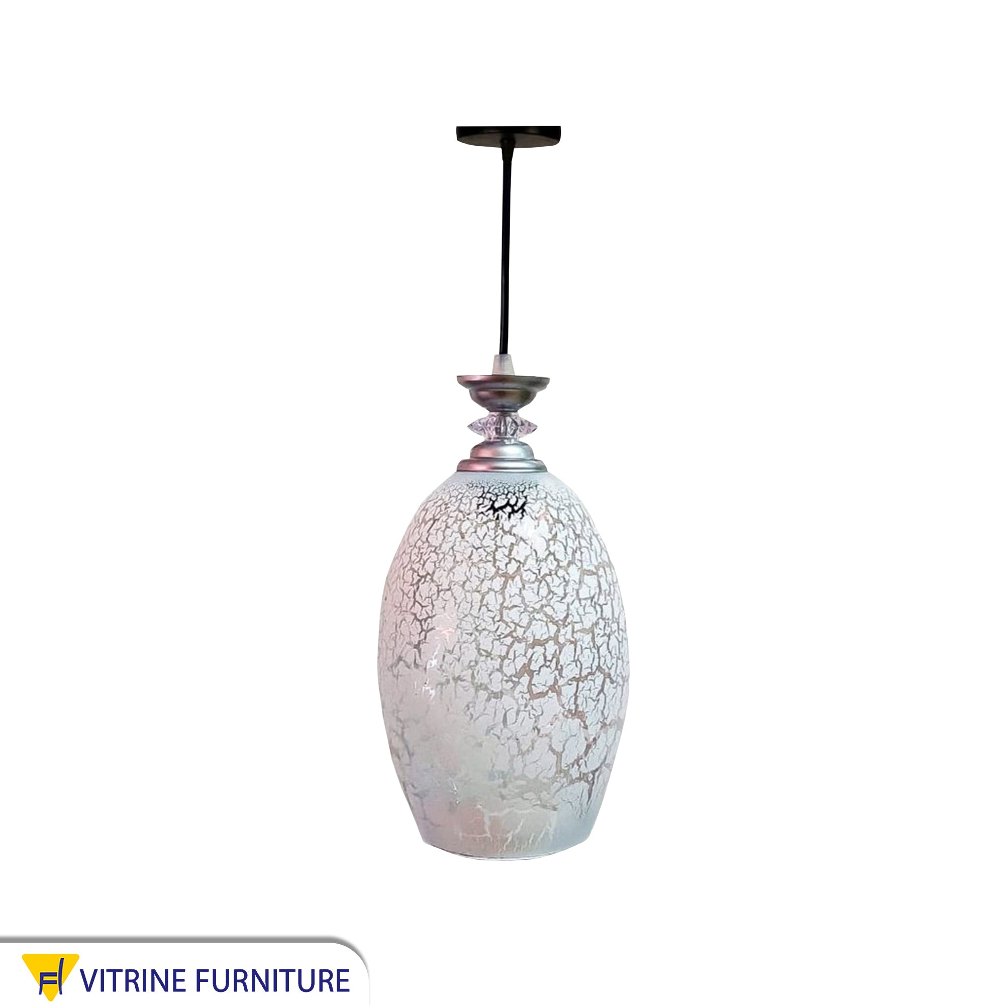 A pendant with a decorated cylindrical glass