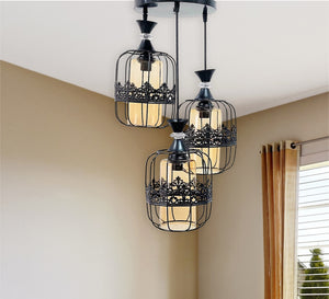 Triple chandelier, black metal and transparent yellow glass