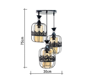 Triple chandelier, black metal and transparent yellow glass