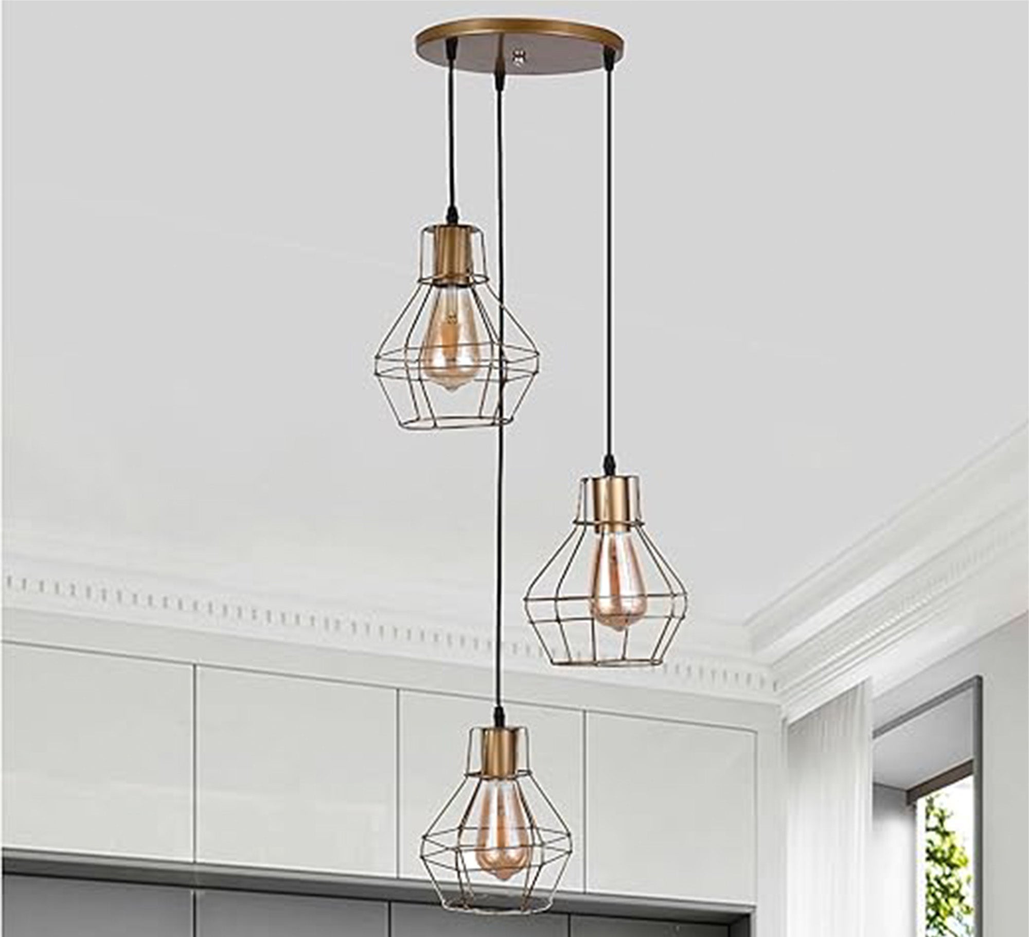 Golden triple chandelier with transparent glass