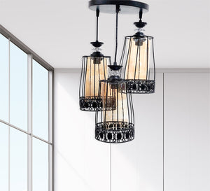 Black chandelier with clear honey glass