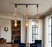 Modern Chandelier with Three Hanging Light Fixtures Suspended by Cables