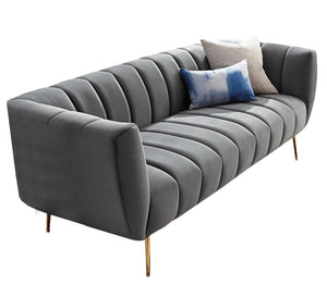 Modern light gray sofa with high legs