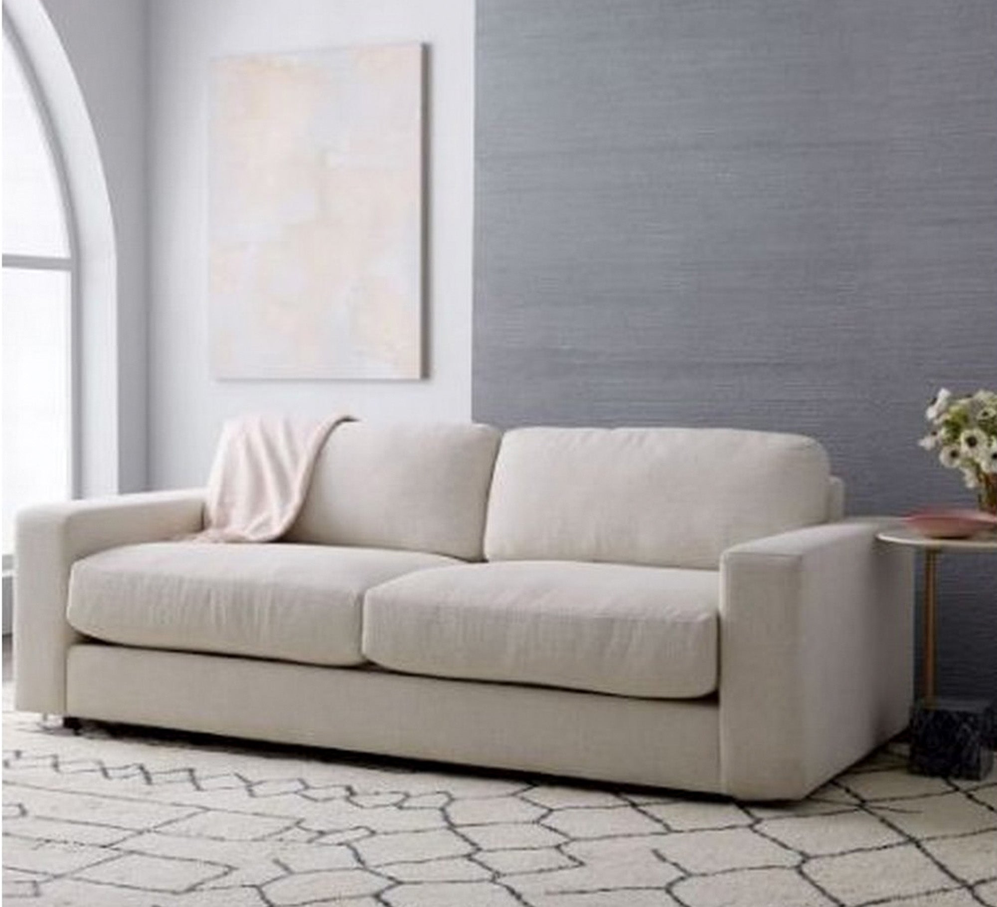 Triple sofa in off-white color