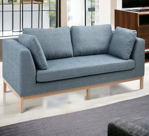 A sofa with movable base and back cushions