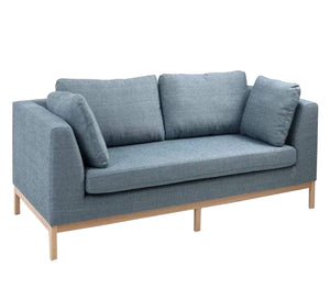 A sofa with movable base and back cushions