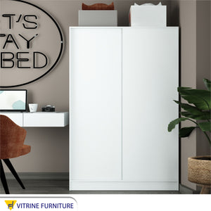 White wardrobe with hinged doors