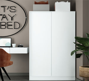 White wardrobe with hinged doors