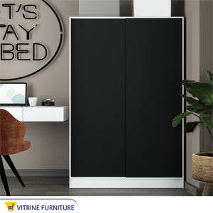 Wardrobe with black wooden doors