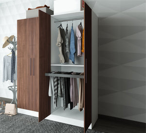 A white cupboard with four brown moving doors