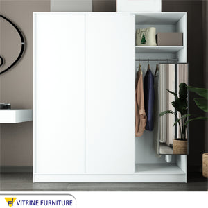 A cupboard with three sliding doors