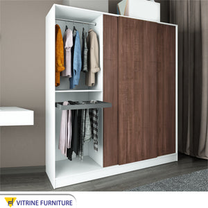 A three-leaf brown sliding wardrobe