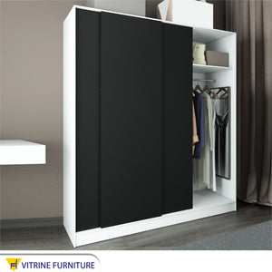 Sliding wardrobe with three doors in black