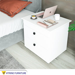 Bedside table with movable surface