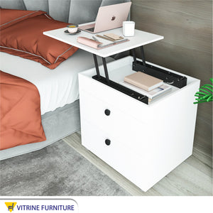 Bedside table with movable surface