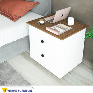 Bedside table with a brown movable surface