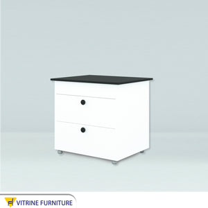 Nightstand with a black moving surface