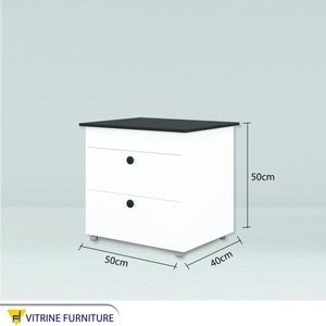 Nightstand with a black moving surface