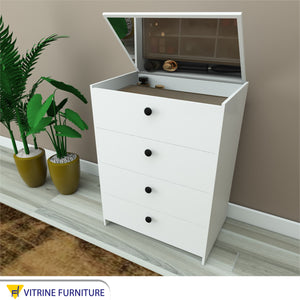 Dresser with movable top