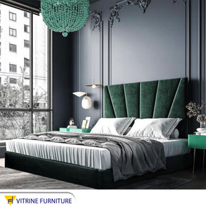 Green upholstered bed