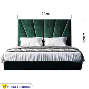 Green upholstered bed