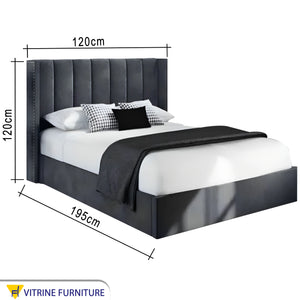 Single bed upholstered in vertical parallel lines