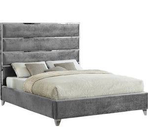 Light gray bed with velvet back