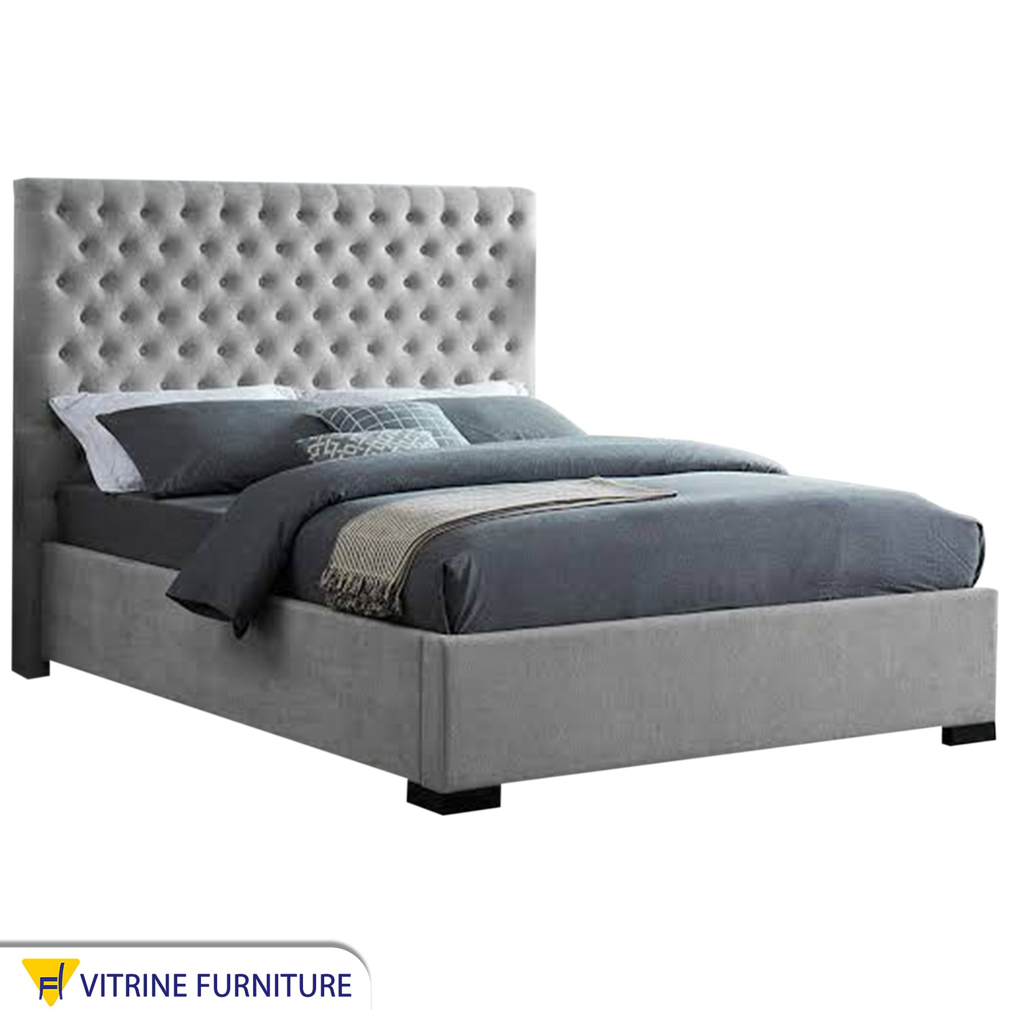 Light gray bed with Cabotain upholstery