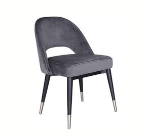 Round back chair upholstered in dark grey