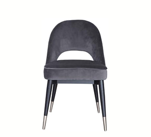 Round back chair upholstered in dark grey