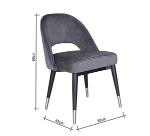 Round back chair upholstered in dark grey