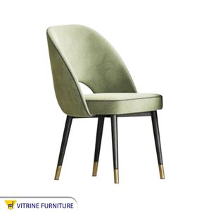 A distinctively upholstered chair in multiple colors