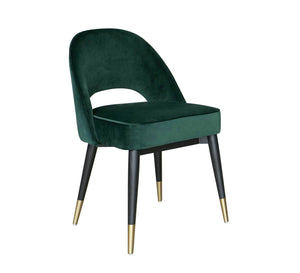 Round back chair upholstered in drak green