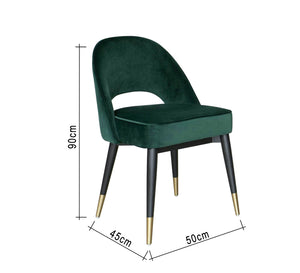 Round back chair upholstered in drak green