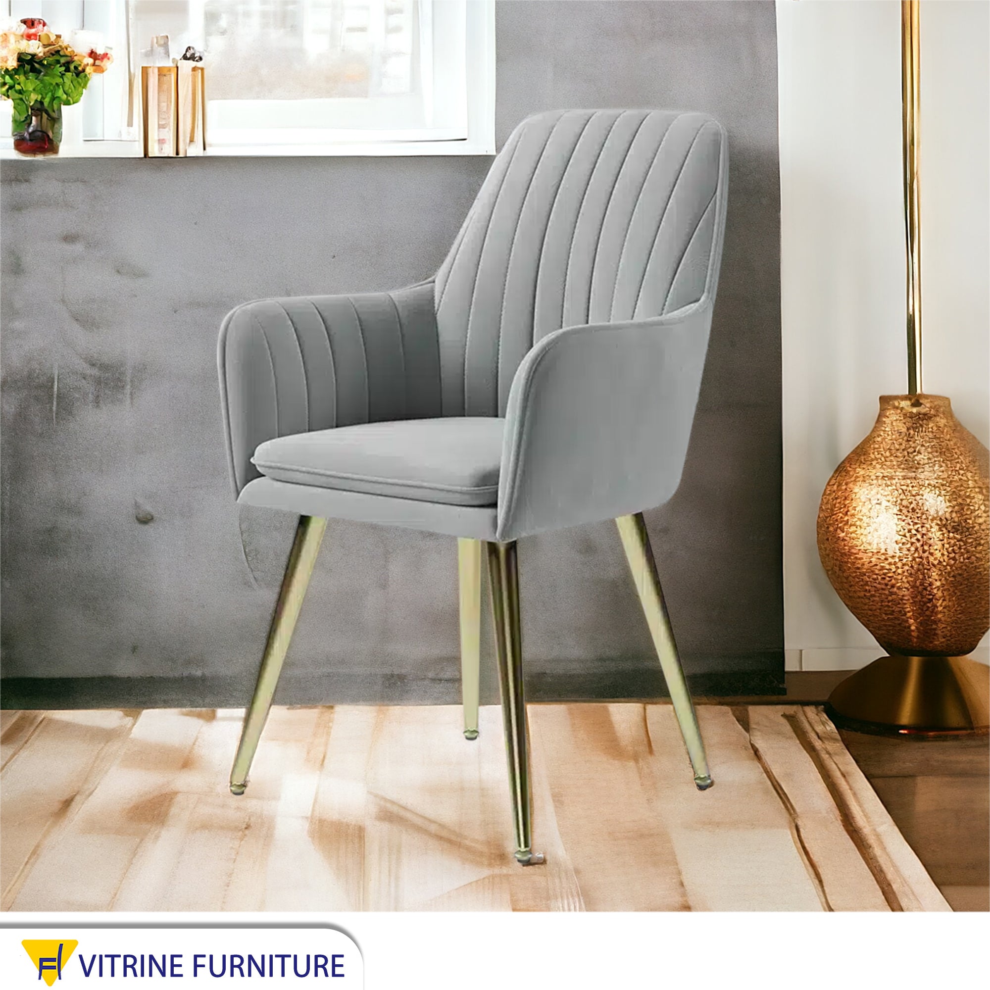 Light grey upholstered armchair