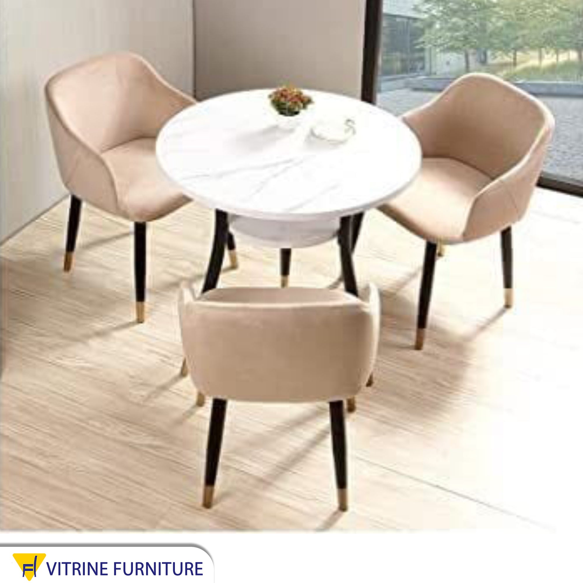 Circular dining table with three chairs