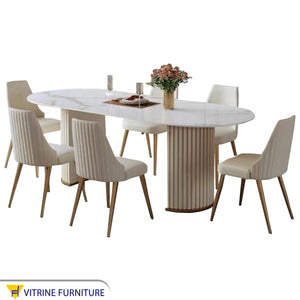 A dining table with a unique and elegant design