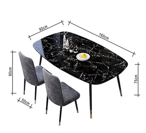 Black dining table decorated with white