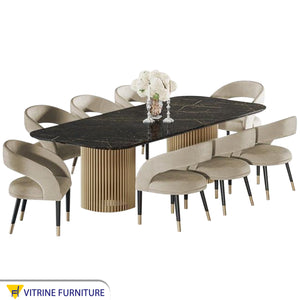 A large dining table with cylindrical legs