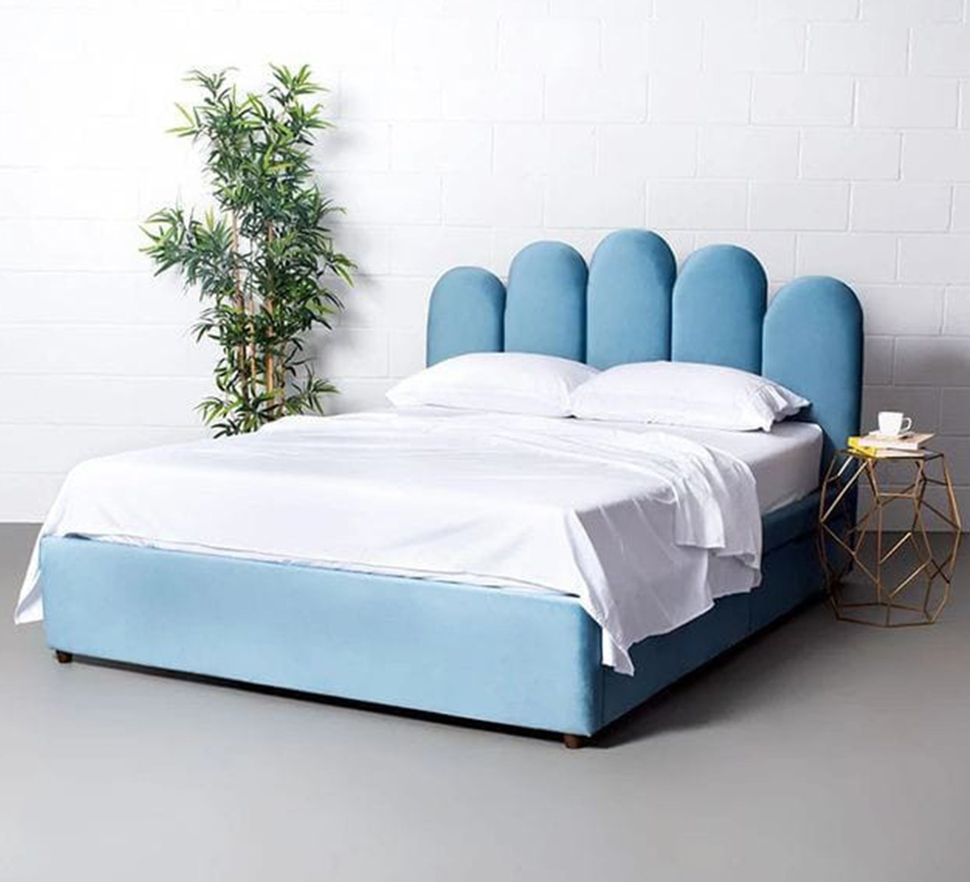 Blue bed with a comfortable design with vertical stripes