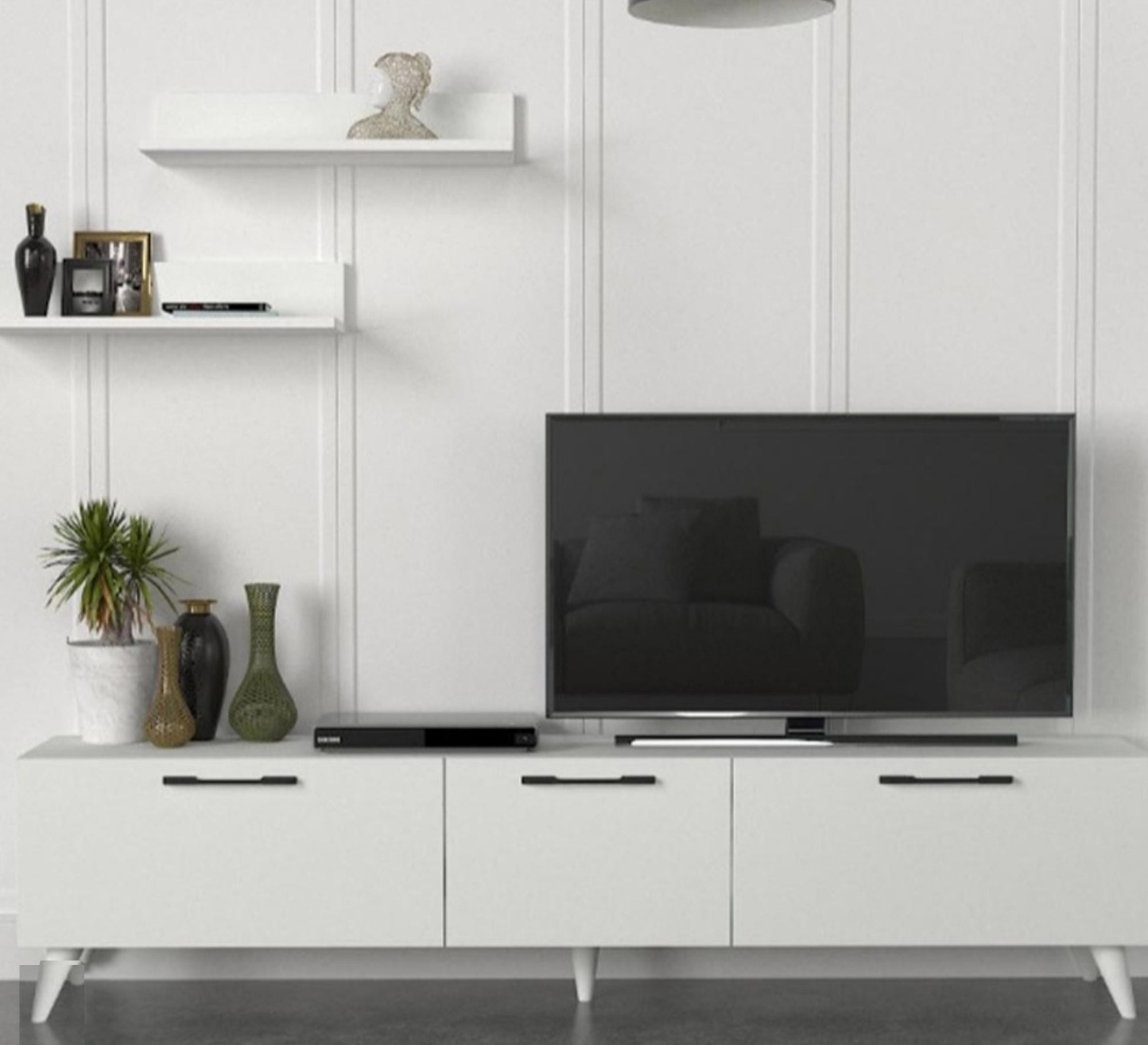 A white TV screen unit raised on legs