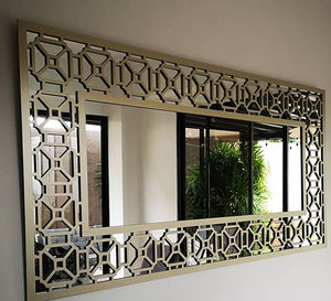 Mirror with a wide hollow wooden frame