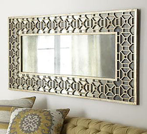 Mirror with a wide hollow wooden frame