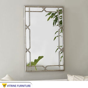 Rectangular mirror framed with Islamic decorations