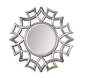 A circular mirror with a frame of hollow overlapping circles