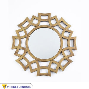 مرآة دائرية مع إطار من الدوائر المتداخلة المجوفة