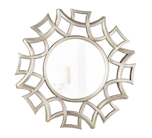 A circular mirror with a frame of hollow overlapping circles